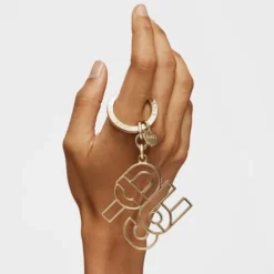 Porta-chaves Silhouette dourado TOUS MANIFESTO